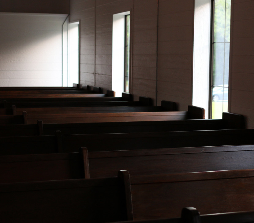 A photo of the pews at Sainte Terre