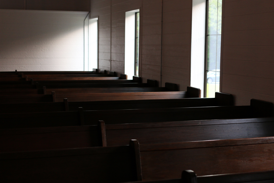 A photo of the pews at Sainte Terre